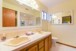 The master bathroom has double sinks, and a great shower
